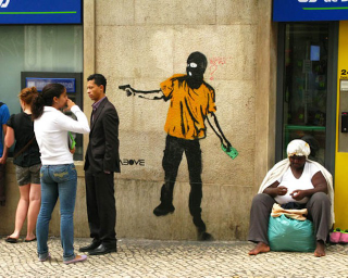 Illustration for article titled 7 Street Art Stencils That Interact With Their Surroundings
